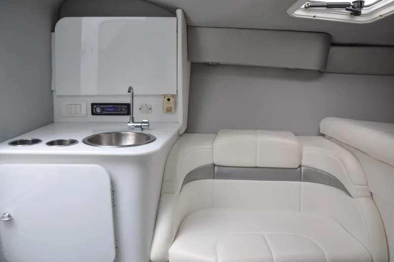 Slide: The Image of 2006 Formula 271 FASTech cabin interior with kitchenette and seating area. - 16