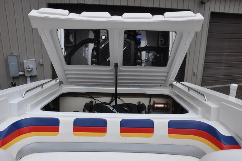 Slide: The Image of 2006 Formula 271 FASTech boat engine compartment with colorful exterior detailing. - 19