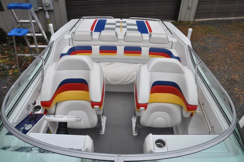 Slide: The Image of 2006 Formula 271 FASTech boat interior with colorful seating and sleek design. - 7