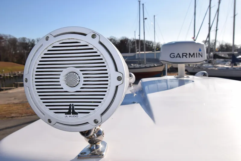 Slide: The Image of JL Audio speaker and Garmin device on 2005 Donzi 38 ZSF boat deck. - 22
