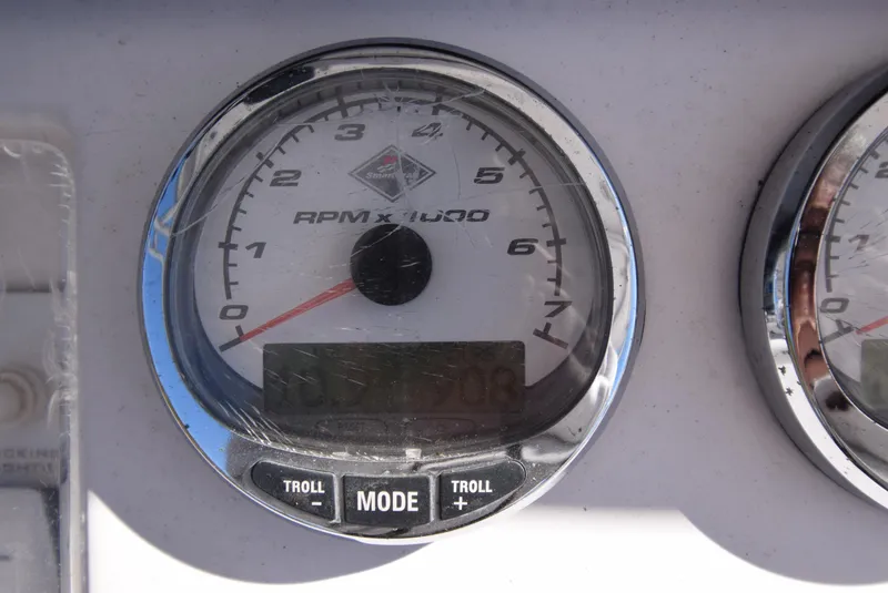 Slide: The Image of Tachometer of 2005 Donzi 38 ZSF boat, displaying RPM and digital readout. - 28
