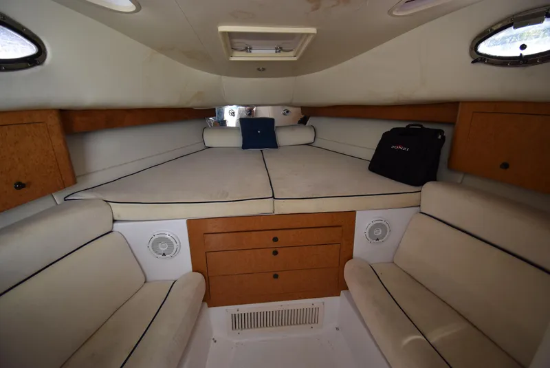 Slide: The Image of Interior cabin of 2005 Donzi 38 ZSF boat with seating and storage. - 37