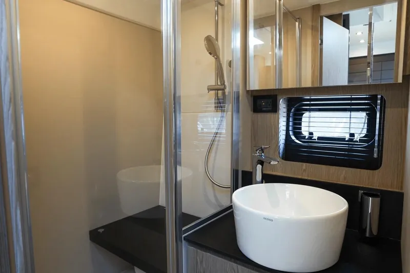 Slide: The Image of Luxurious bathroom in 2026 Azimut Atlantis 45 yacht with modern sink and shower. - 34