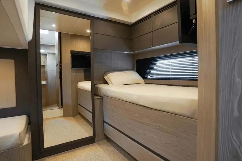 Slide: The Image of Luxurious interior of 2026 Azimut Atlantis 45 yacht with modern wood finishes. - 36