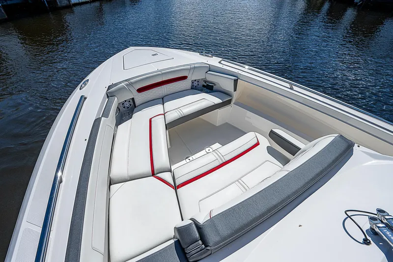 Slide: The Image of 2021 Tiara Yachts 34 LS boat with luxurious seating on calm water. - 13