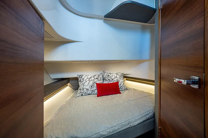 Slide: The Image of Luxurious cabin interior of 2021 Tiara Yachts 34 LS with modern bedding. - 20