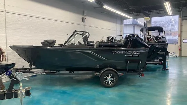 The Image of 2025 Crestliner 1650 Hawk boat in showroom, side view. - 0