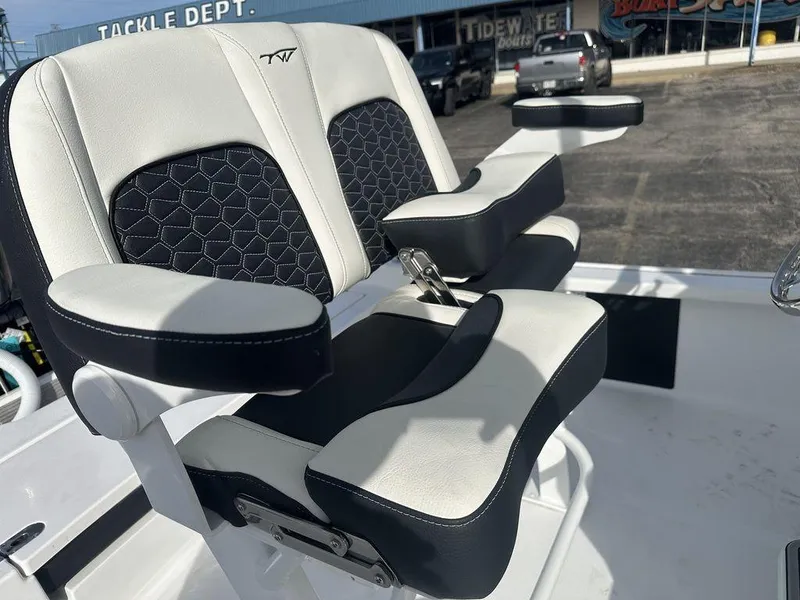 Slide: The Image of 2025 Tidewater 2210 Cb boat seats with armrests, black and white design. - 11
