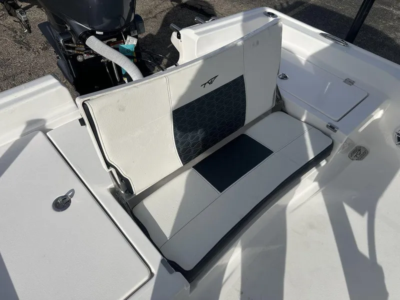 Slide: The Image of 2025 Tidewater 2210 Cb boat seat with white and black upholstery. - 12