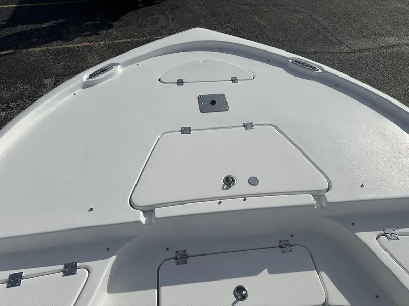 Slide: The Image of 2025 Tidewater 2210 Cb boat deck with storage compartments. - 13