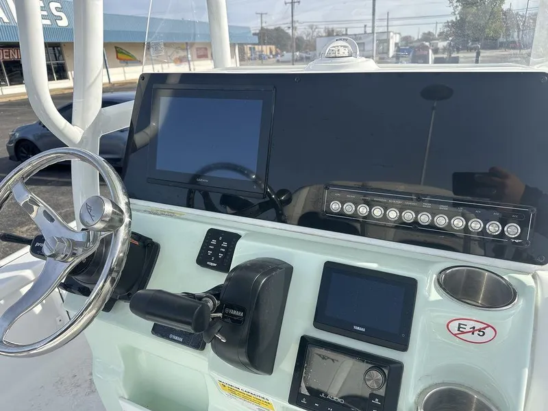 Slide: The Image of 2025 Tidewater 2210 Cb boat dashboard with modern navigation and control systems. - 8