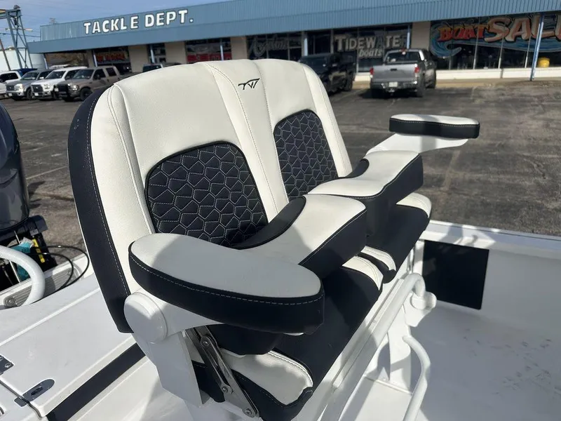 Slide: The Image of 2025 Tidewater 2210 Cb boat seat with armrests in dealership lot. - 9