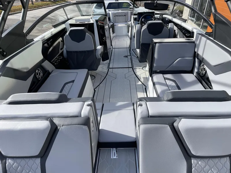 Slide: The Image of 2025 Yamaha Boats 255XD interior, featuring sleek, modern seating and advanced dashboard design. - 4