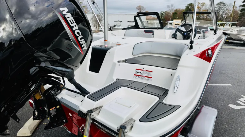 Slide: The Image of 2025 Bayliner M17 boat with Mercury engine, featuring sleek design and spacious seating. - 6