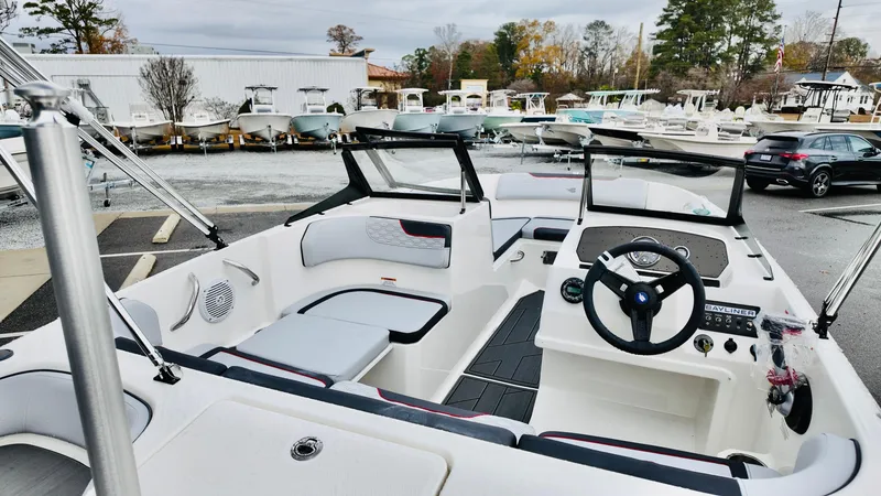 Slide: The Image of 2025 Bayliner M17 boat interior with modern design and spacious seating. - 9