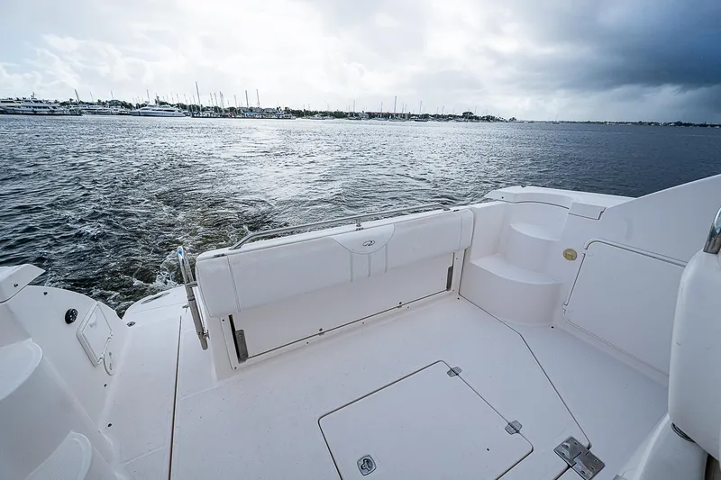 Slide: The Image of 2008 Regal Commodore 3760 IB boat deck overlooking calm waters. - 23