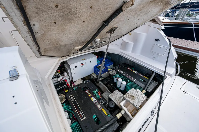 Slide: The Image of Engine compartment of 2008 Regal Commodore 3760 IB boat, showcasing dual engines and components. - 29