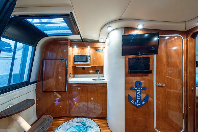 Slide: The Image of Luxurious interior of 2008 Regal Commodore 3760 IB yacht with modern amenities. - 37