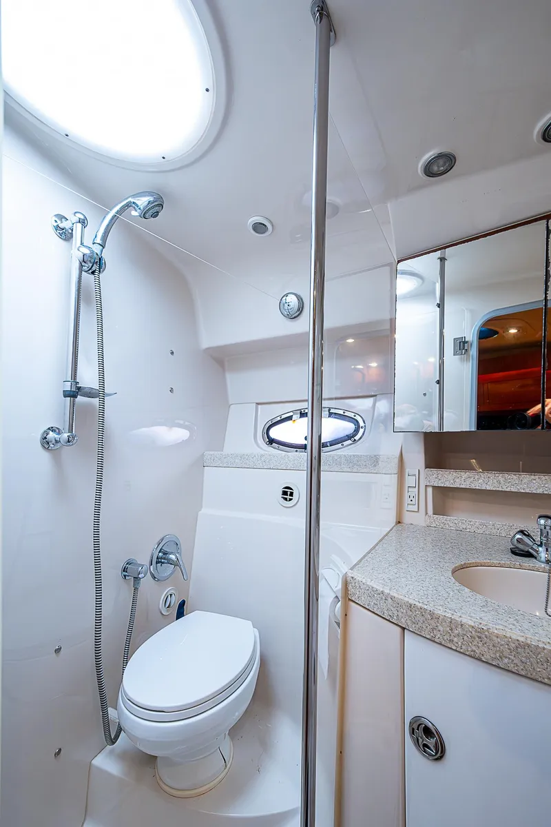 Slide: The Image of 2008 Regal Commodore 3760 IB yacht bathroom with shower, toilet, and sink. - 46