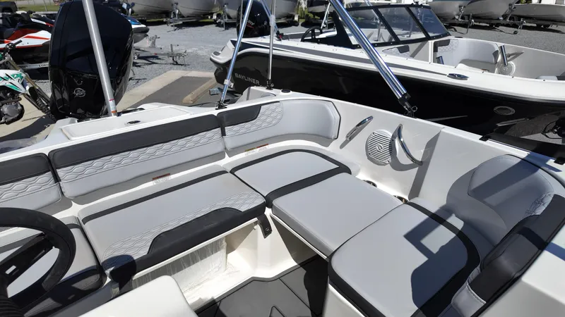 Slide: The Image of 2025 Bayliner M17 boat interior with sleek seating and modern design. - 8