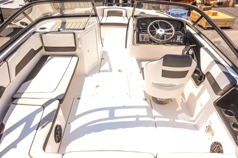 Slide: The Image of 2025 Yamaha Boats AR195 interior with sleek seating and modern dashboard design. - 10