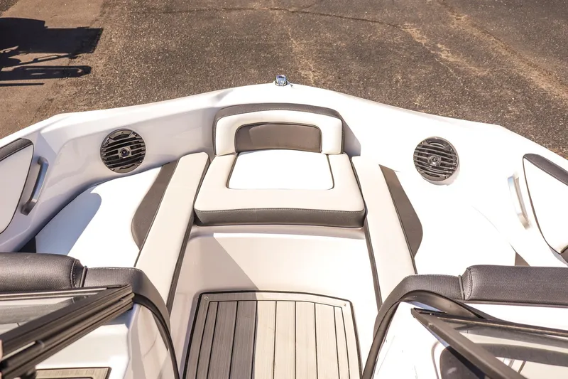 Slide: The Image of 2025 Yamaha Boats 195S interior, featuring sleek seating and modern design elements. - 17
