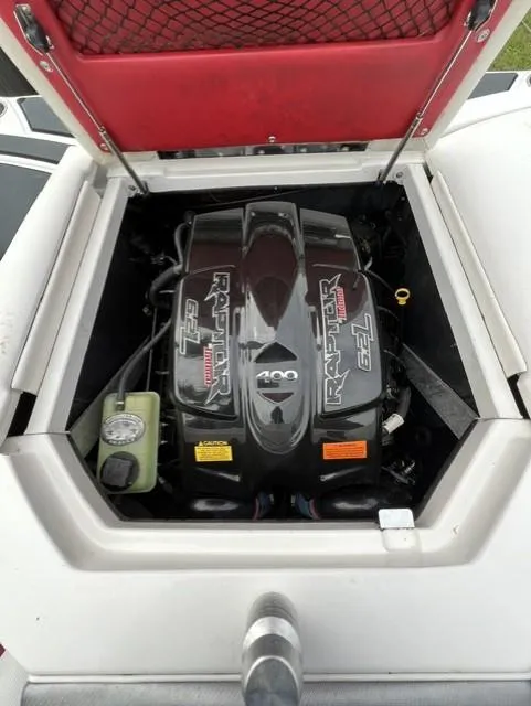 Slide: The Image of 2015 Tigé RZR boat engine compartment with Raptor 400 motor. - 18