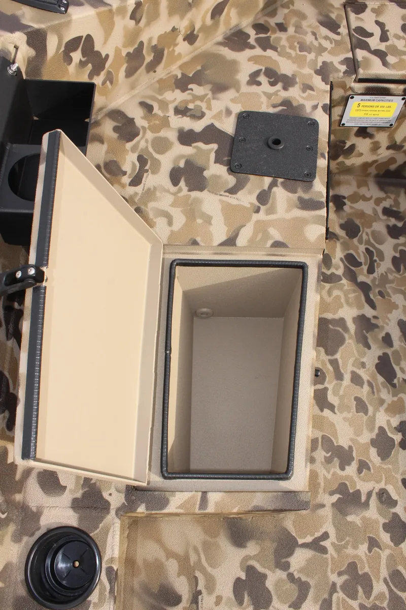 Slide: The Image of 2025 Excel 1860 Viper F4 CC boat with open storage compartment, camo design. - 19