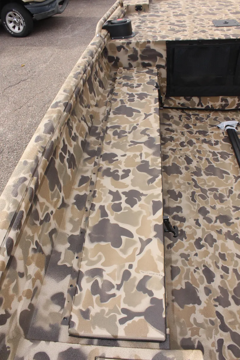 Slide: The Image of 2025 Excel 1860 Viper F4 CC boat interior with camouflage design. - 22