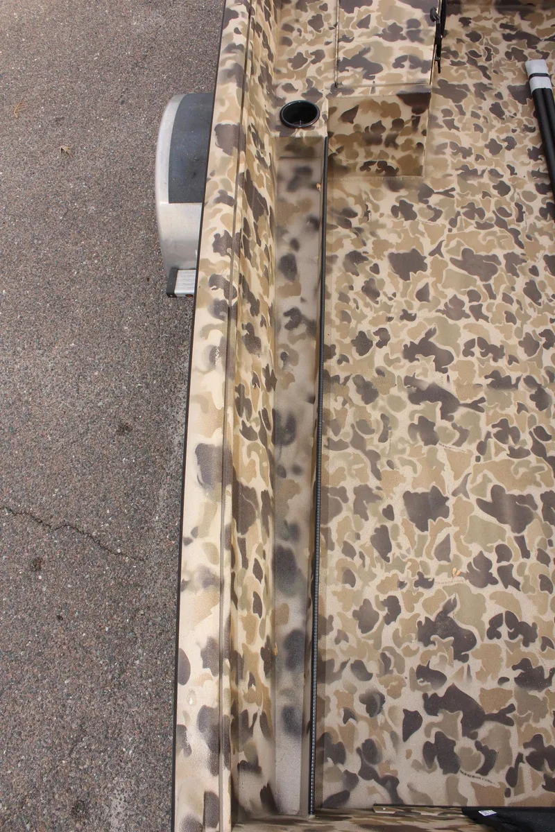 Slide: The Image of 2025 Excel 1860 Viper F4 CC boat with camouflage pattern deck. - 24