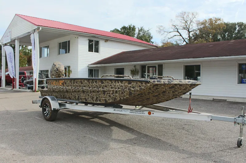 Slide: The Image of 2025 Excel 1860 Viper F4 CC boat on trailer outside dealership. - 5