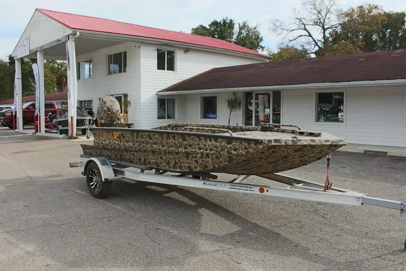 Slide: The Image of 2025 Excel 1860 Viper F4 CC boat on trailer outside dealership. - 6