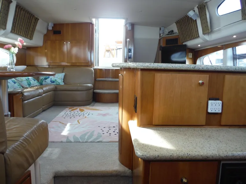 Slide: The Image of Interior of 2001 Carver 466 Motor Yacht with luxurious seating and modern amenities. - 39