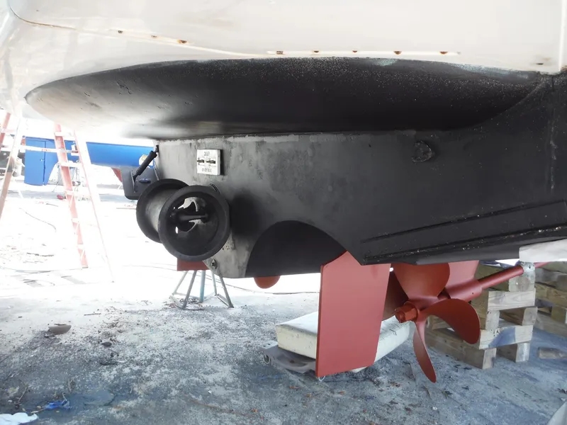 Slide: The Image of Bottom view of 2001 Carver 466 Motor Yacht with visible propeller and rudder. - 43