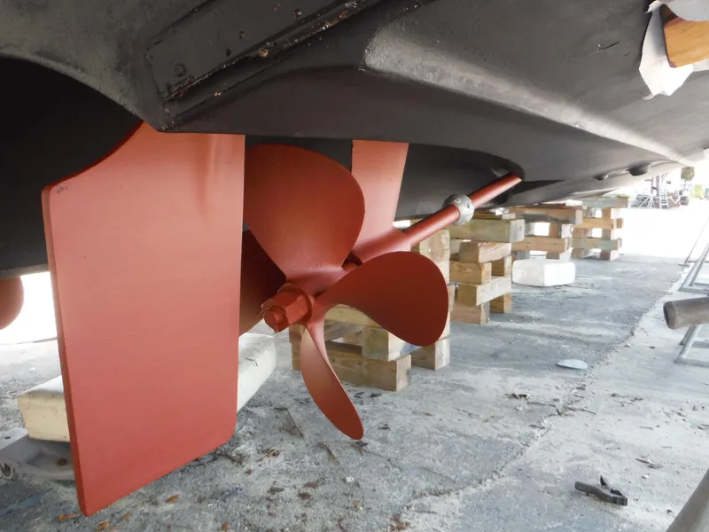 Slide: The Image of Propeller and rudder of 2001 Carver 466 Motor Yacht on dry dock. - 44