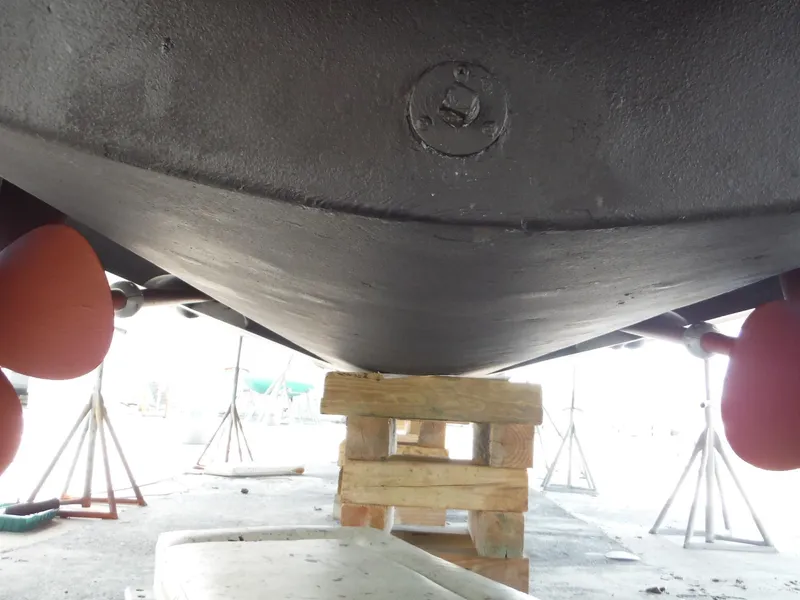 Slide: The Image of Bottom view of a 2001 Carver 466 Motor Yacht on dry dock. - 48