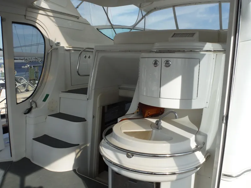 Slide: The Image of Interior of 2001 Carver 466 Motor Yacht with sink and stairs. - 5