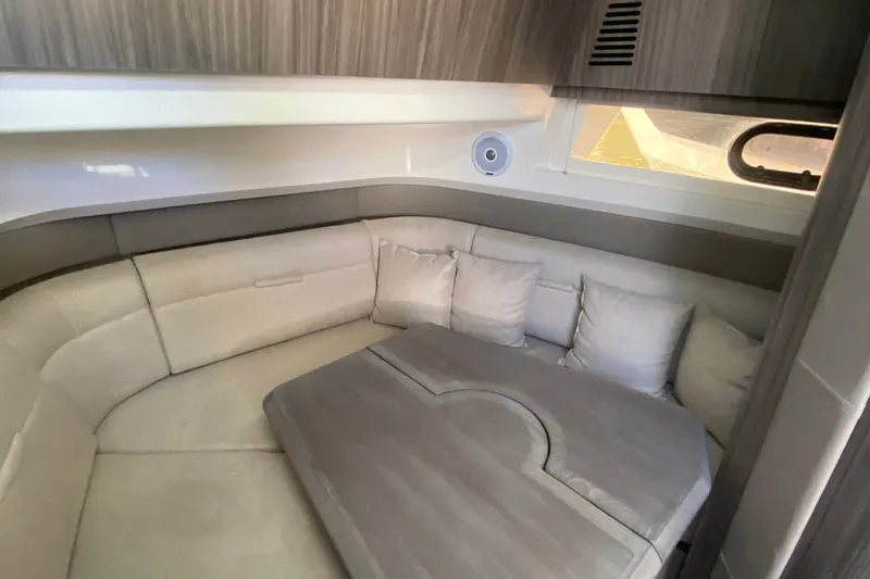 Slide: The Image of 2019 Sea Ray SLX 400 boat deck with sleek design and wood flooring. - 33