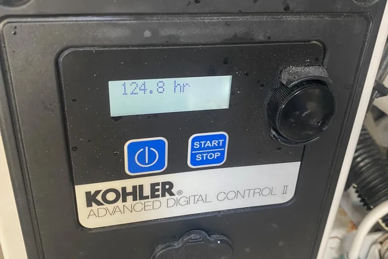 Slide: The Image of 2019 Sea Ray SLX 400 engine compartment with dual V8 engines. - 45