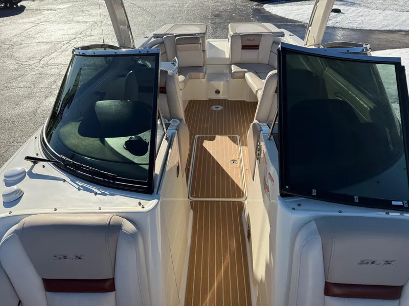 Slide: The Image of 2005 Sea Ray 270 SLX boat interior with open deck and seating. - 4