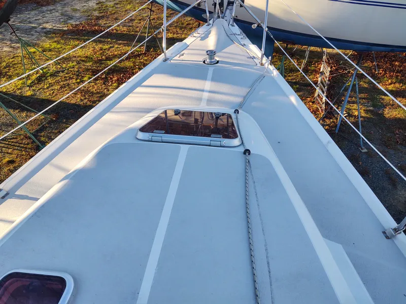 Slide: The Image of Deck view of 2006 Catalina 350 MK II sailboat, featuring clean lines and rigging. - 10