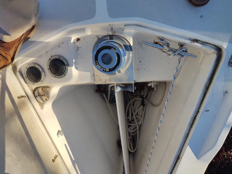 Slide: The Image of Catalina 350 MK II 2006 sailboat deck with winch and rope storage. - 11