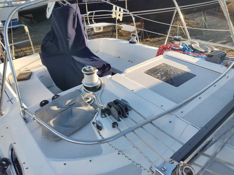 Slide: The Image of 2006 Catalina 350 MK II sailboat cockpit with winches and covered seating. - 15