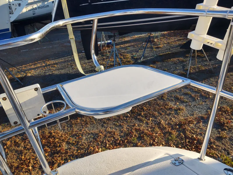 Slide: The Image of Catalina 350 MK II 2006 yacht stern rail with foldable table and cup holder. - 17