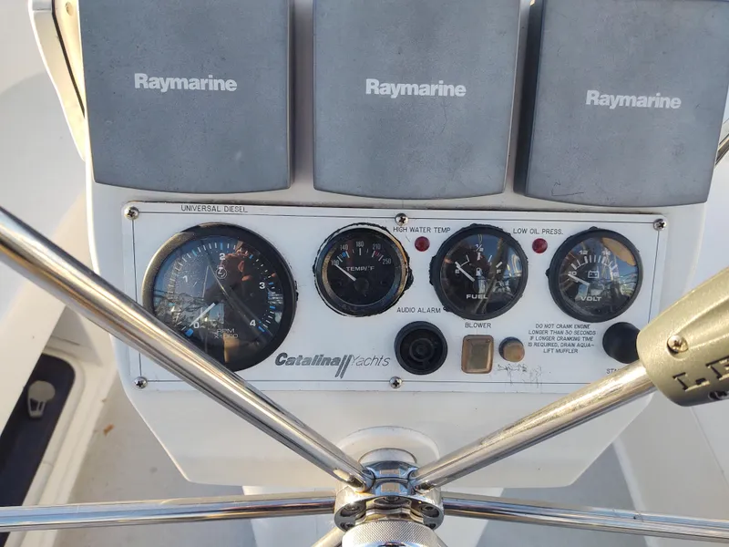 Slide: The Image of Catalina 350 MK II 2006 helm with Raymarine instruments and gauges. - 23