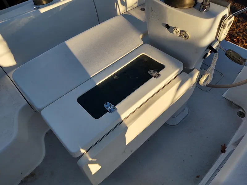 Slide: The Image of Catalina 350 MK II 2006 cockpit seating with storage compartment. - 24