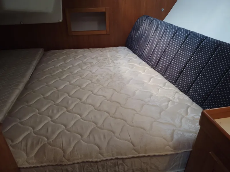 Slide: The Image of Interior cabin of 2006 Catalina 350 MK II with a comfortable bed. - 38