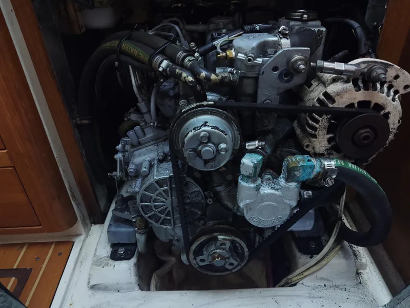 Slide: The Image of Catalina 350 MK II 2006 engine compartment, showcasing mechanical components and belts. - 41