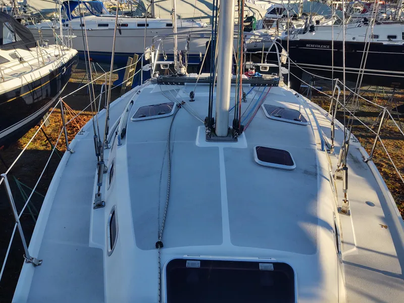 Slide: The Image of 2006 Catalina 350 MK II sailboat deck view with rigging and hatches. - 6