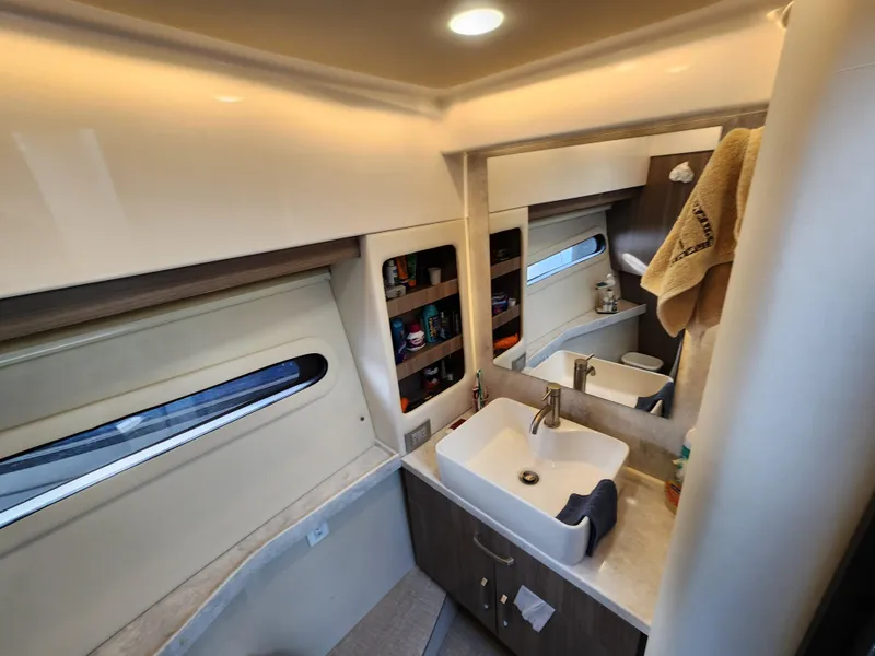 Slide: The Image of Luxurious bathroom interior of 2022 Regal 38 Grande Coupe yacht. - 34